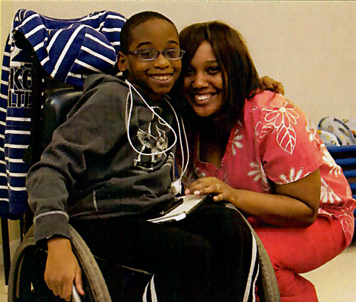 Photo of Student and Staff Member